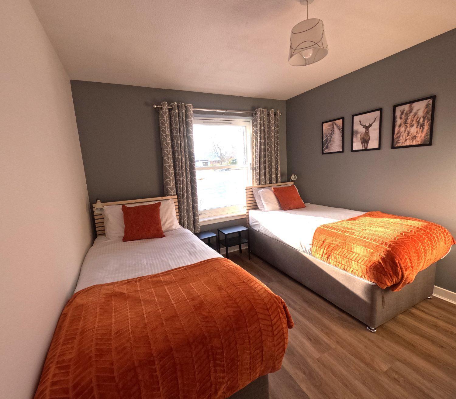 Orange Squirrel Lodge Aviemore Esterno foto